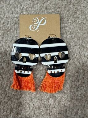 Plunder Black & White Striped Skull Earrings with Orange Tassels